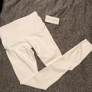 Athleta Contender 7/8 tight with pockets/laser cut